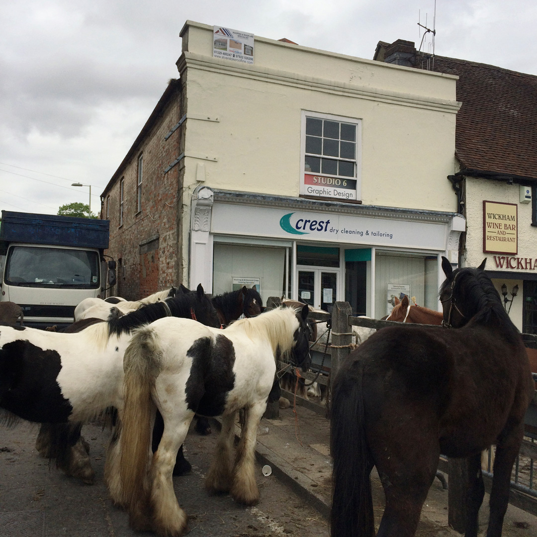 horses on street wickham horsefair hampshire