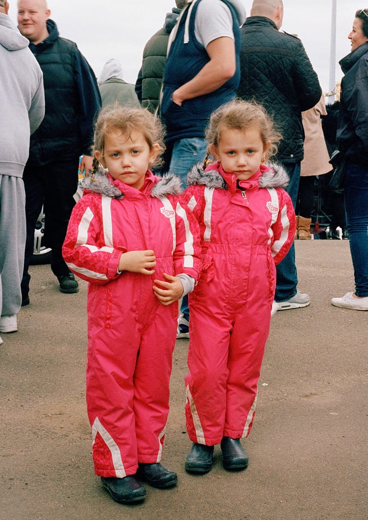twin girls red onesy banger racing foxhall stadium